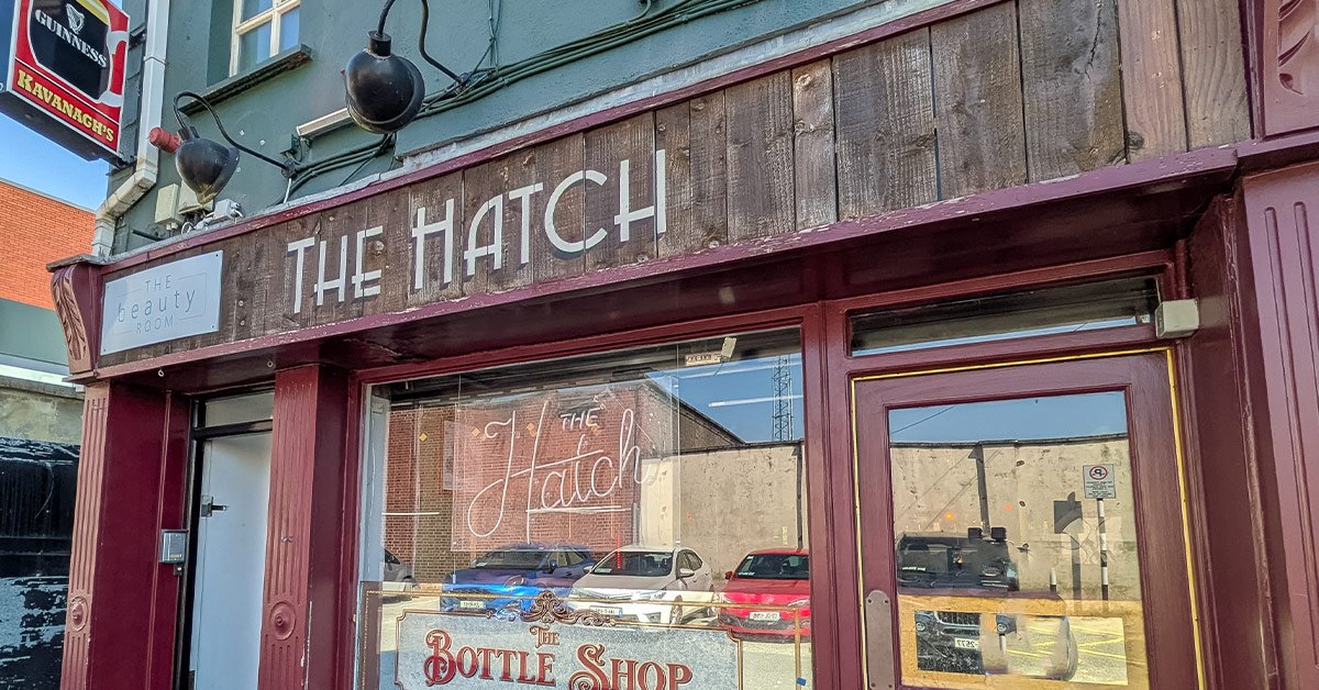 The Hatch frontage with its painted sign and display window